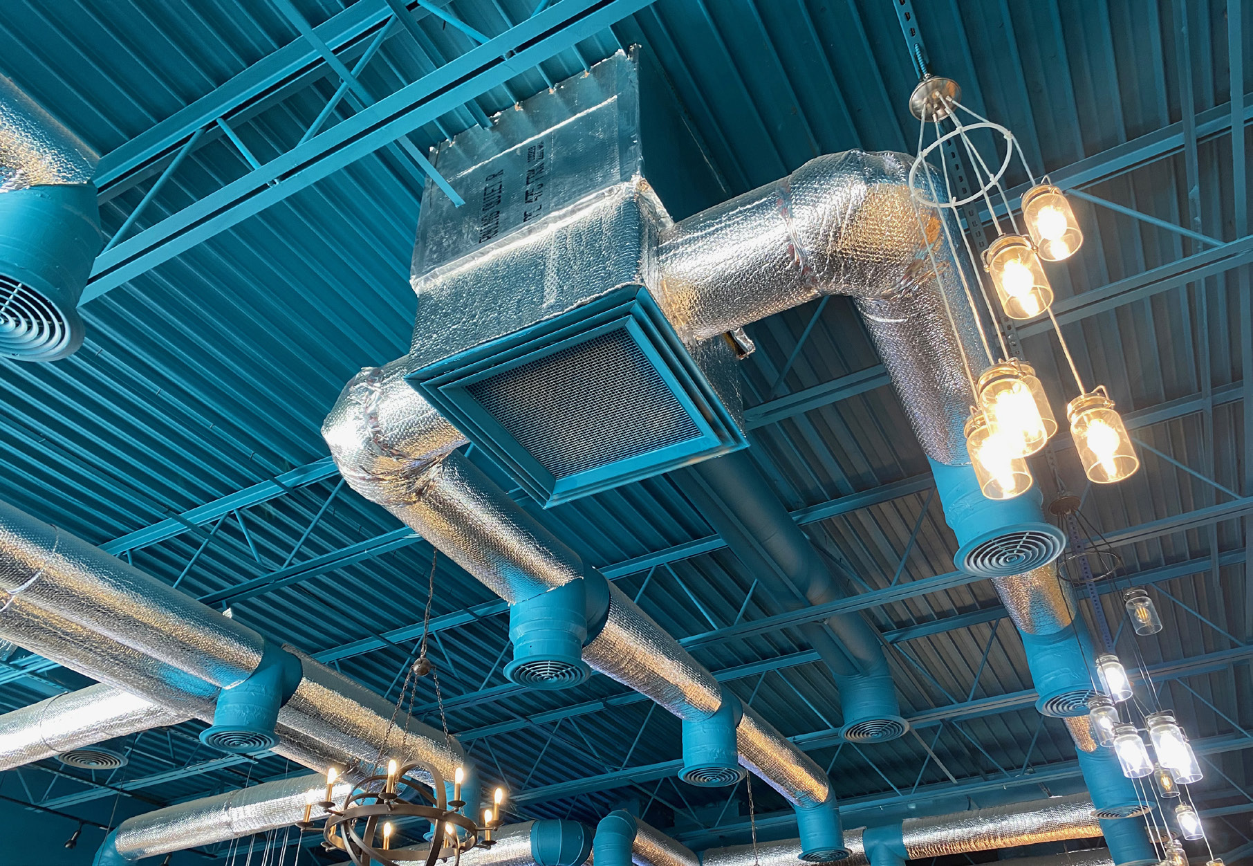 Exposed ducts wrapped in reflective bubble